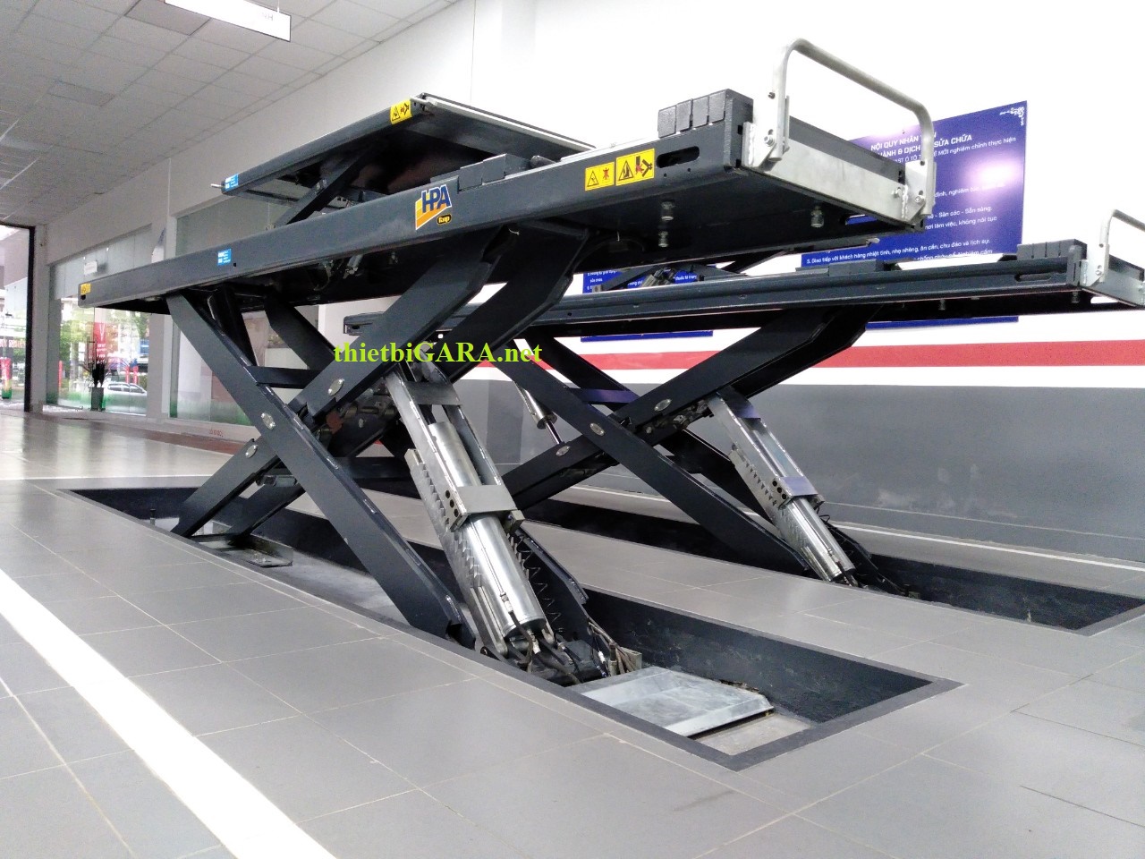 Cầu nâng âm nền nâng cả xe 2 tầng nâng HPA Italy